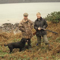 Hunters with dog